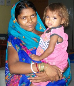 Puja and her mother Rinku in July 2012